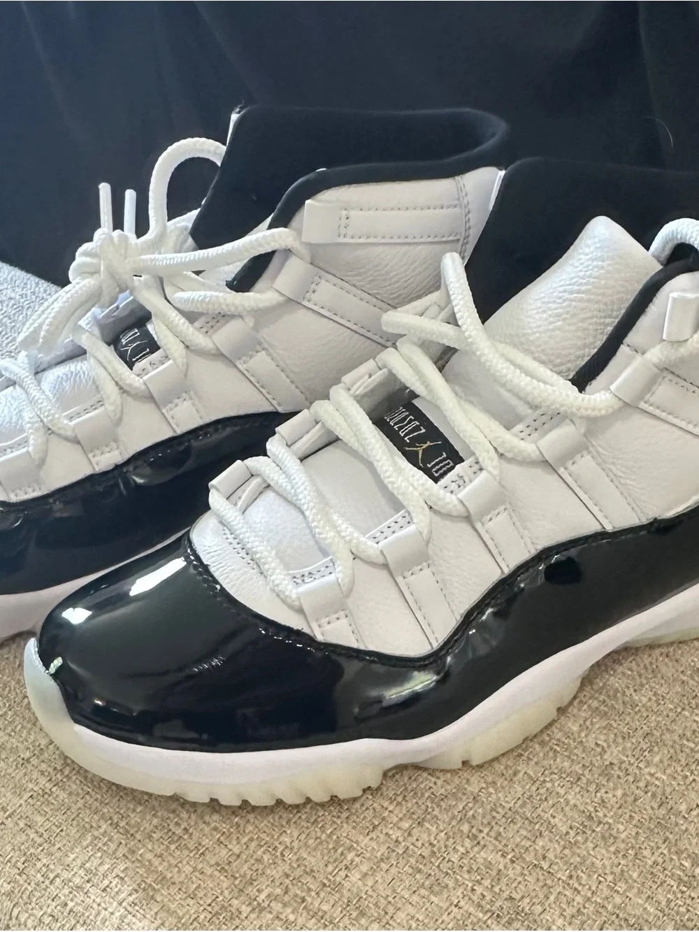 Air Jordan’s 11 Never Been Worn Black and White High-Top Athletic Sneakers